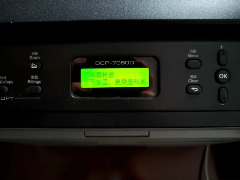 image of removing Brother printer “replace toner cartridge” prompt