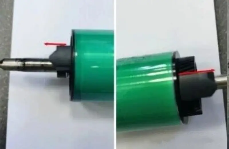Removing the positioning pins from a Konica Minolta OPC drum