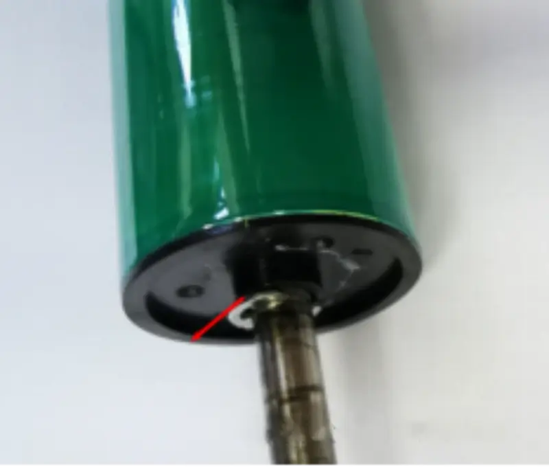 Removing the retaining clip from a Konica Minolta OPC drum