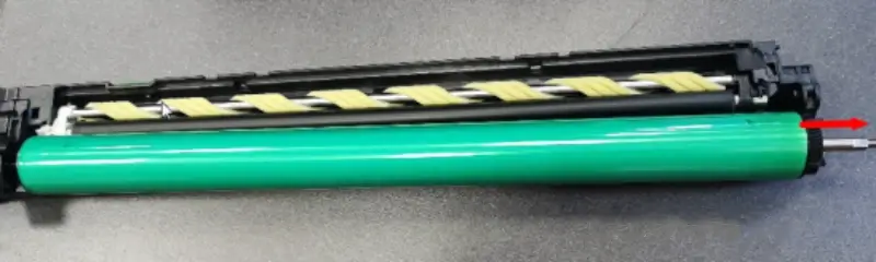 Removing the metal shaft from a Konica Minolta OPC drum
